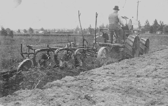 John plowing a field